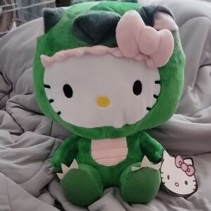 Hello Kitty Dinosaur Plush with Pink Bow